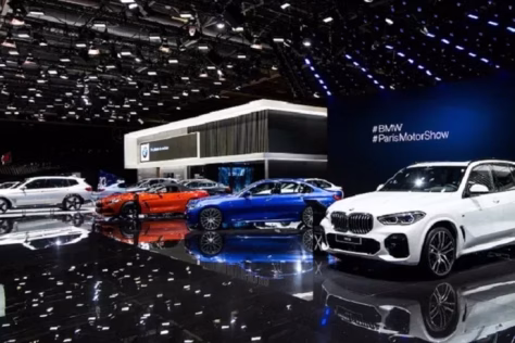 Europos automobilių milžinės grįžta į tarptautines parodas: BMW ir „Mini“ dalyvaus Paryžiaus automobilių parodoje, baiminasi Kinijos bendrovių konkurencijos