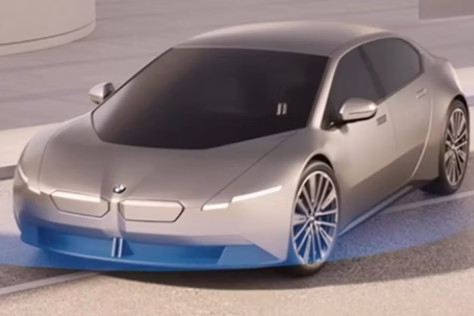 BMW gerbėjai nustėro: reklamoje pasirodęs paslaptingas sedanas gali būti naujos kartos „i4“ užuomina